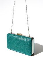 CLUTCH DISEÑO ONDAS BRILLOSO - Imagen 2